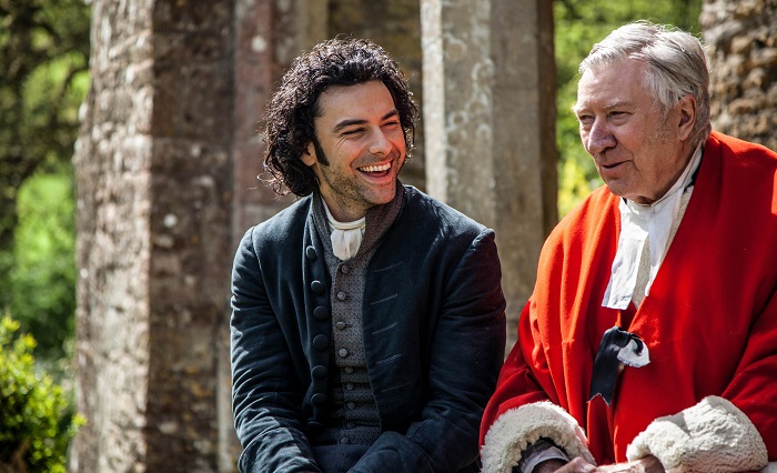 A blast from the past: The new Poldark AIDAN TURNER with original Ross actor ROBIN ELLIS as Reverend Halse - Image Credit: BBC/Mammoth Screen/Mike Hogan