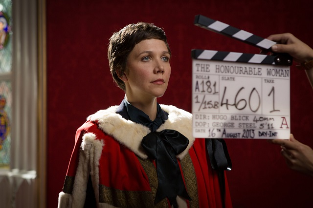 Behind the scenes filming image. Maggie Gyllenhaal is dressed in character her robes at the House of Lords - Image Credit: BBC/Drama Republic. Photographer: Robert Viglasky