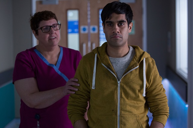Midwife Geraldine (LORRAINE CHESHIRE) with Dev (SACHA DHAWAN) - Image Credit: BBC/Rollem Productions