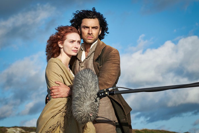 Behind the scenes of Poldark filming, complete with period acurate boom mic: Demelza (ELEANOR TOMLINSON) with Ross Poldark (AIDAN TURNER) - Image Credit: BBC/Mammoth Screen/Mike Hogan