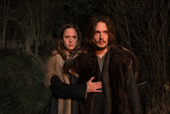 The Last Kingdom cast members: Brida (EMILY COX) and Uhtred (ALEXANDER DREYMON) - Image Credit: BBC/Carnival Films/Joss Barratt 